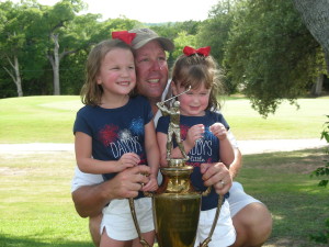Michael Cooper with his daughters after his 2013 Firecracker Open win