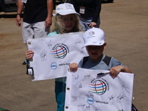 Young fans with their autographed flags.