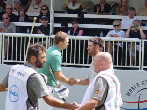 Jordan Spieth shakes hands with Louis Oosthuizen after their match