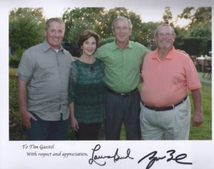 Tim Gaestel and Richard Gaestel at the Warrior Open in 2013 with former President George H.W. Bush and wife Laura Bush [From left to right: Tim Gaestel, Laura Bush, President Bush, Richard Gaestel]