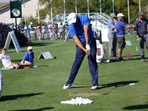 Johnathan Vegas demonstrating technique to young golfers in clinic at Dell Match Play